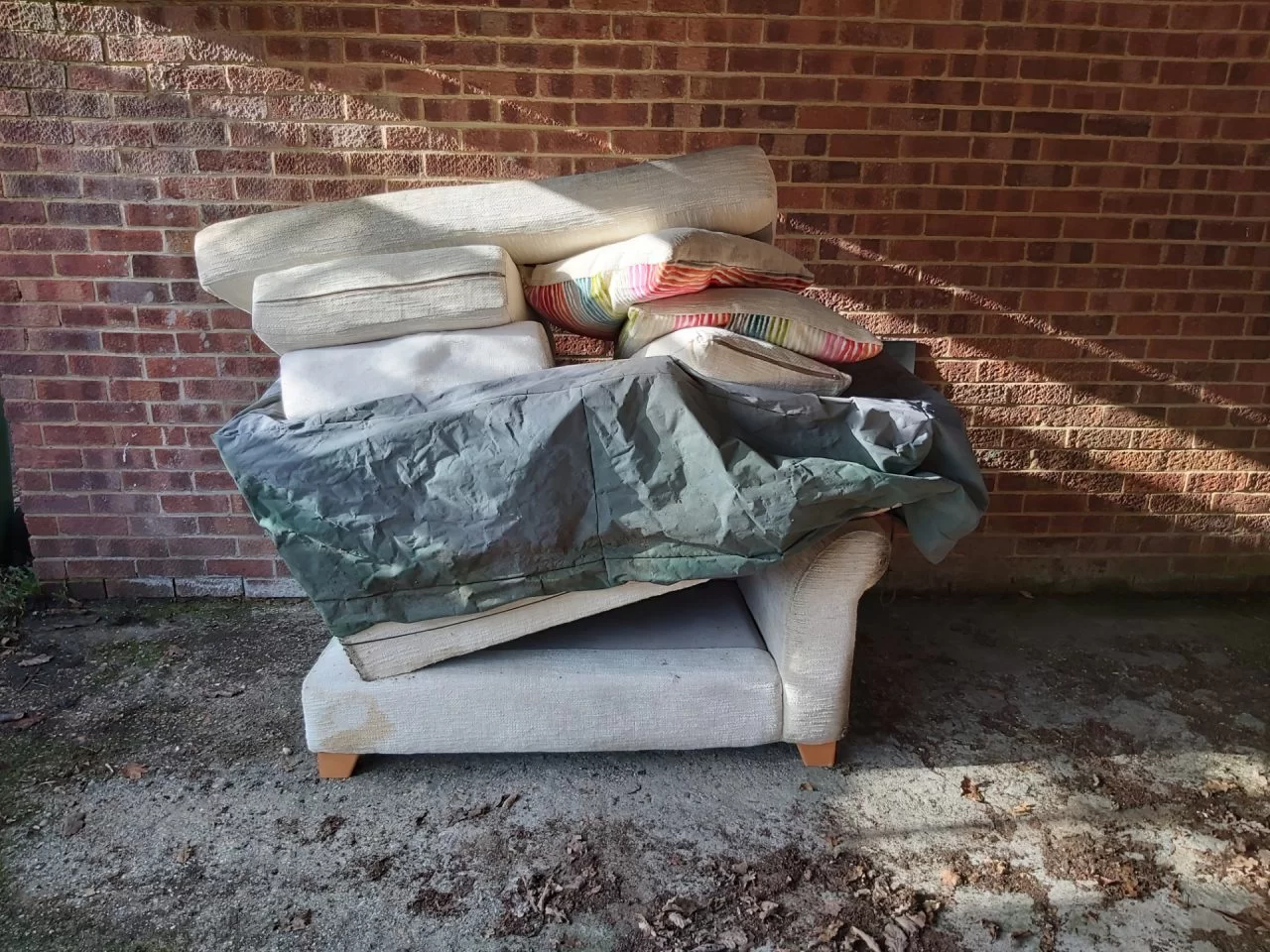 household junk sofa collection and removal from outside property