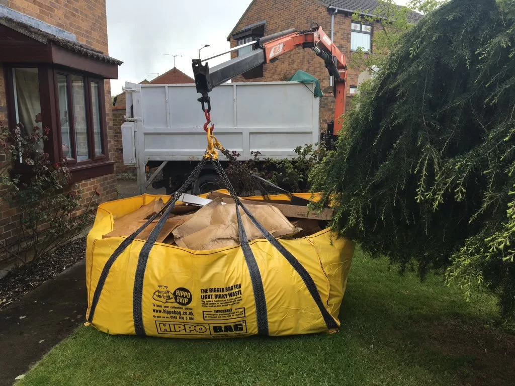 hippobag skip bag being lifted by crane for collection